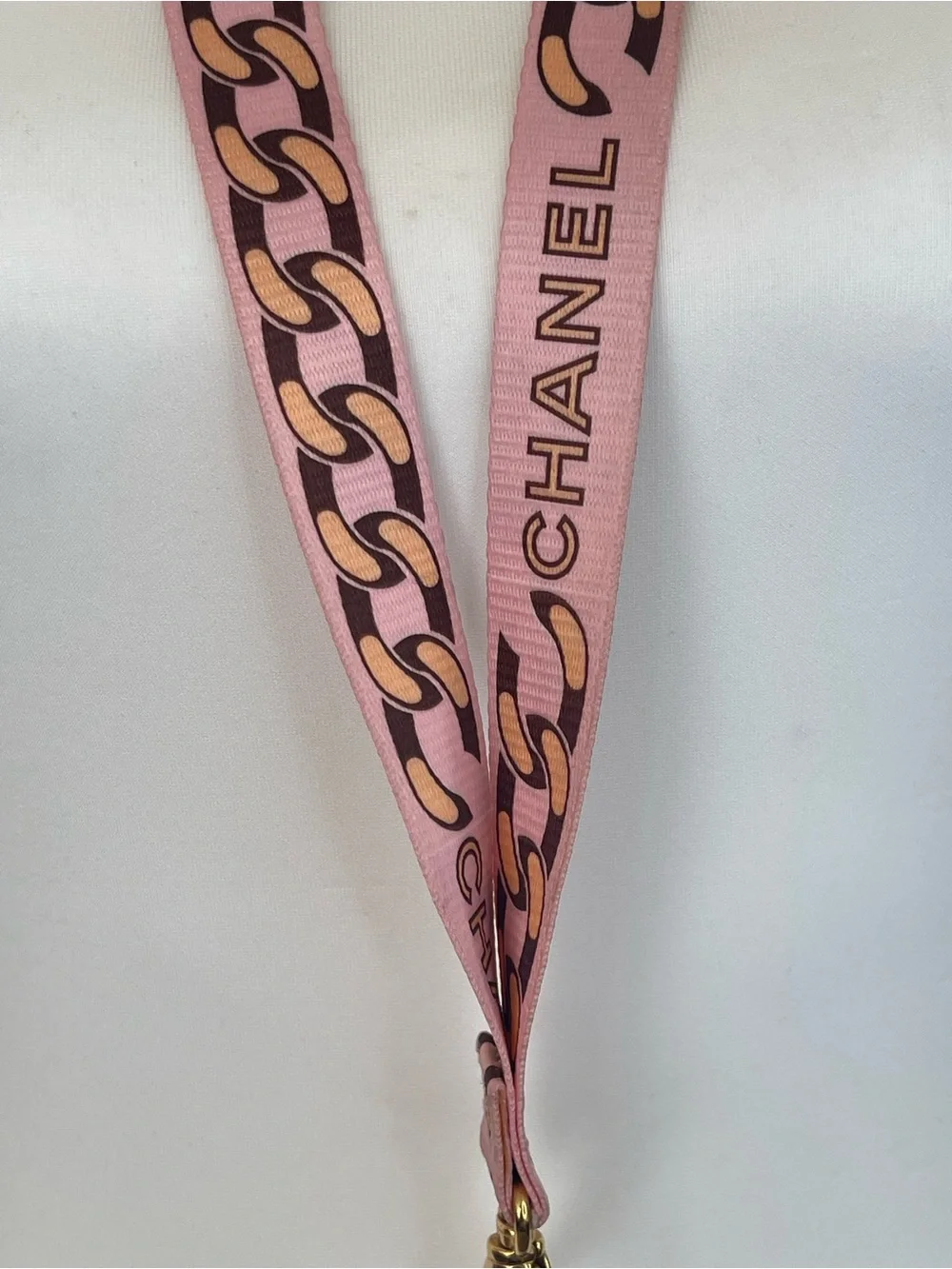 CHANEL Pink Chain-Print Lanyard with Gold Hardware
